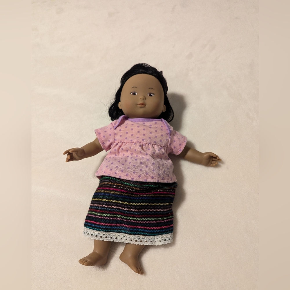 Corolla les cheries doll. Soft body with plastic head arm and legs.  GUC.
